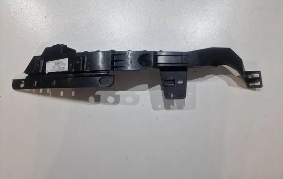 Opel Astra J Headlight/headlamp mounting bracket 13287641 13264479