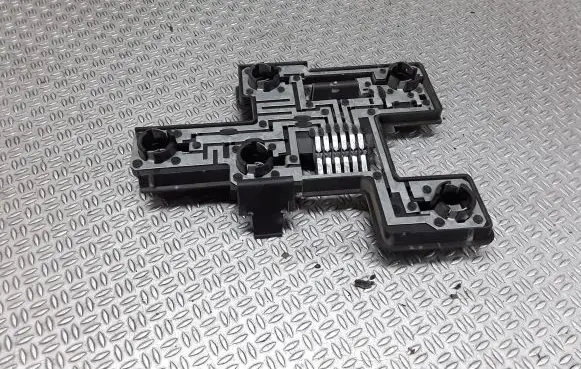 Tail light bulb cover holder