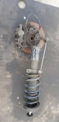 Nissan Primastar Front shock absorber with coil spring