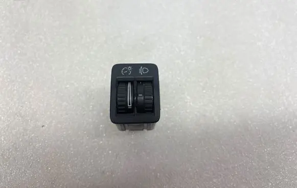 Headlight level height control switch