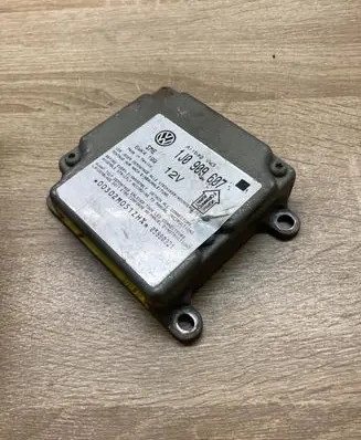 Volkswagen PASSAT B5 Airbag control unit/module 1J0909607 5WK4199