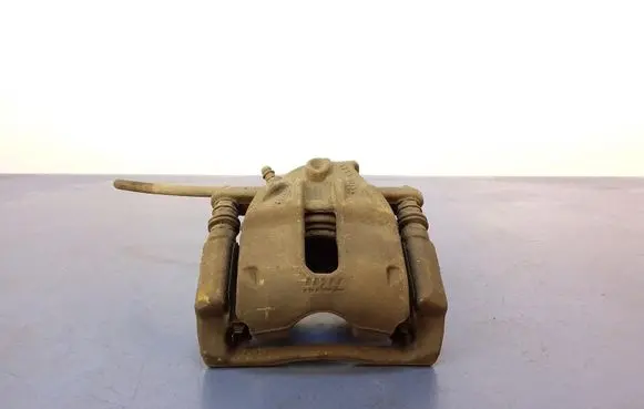 Nissan Note (E11) Front brake caliper