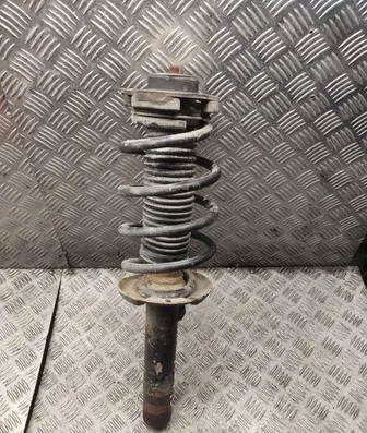 Volkswagen Caddy Front shock absorber with coil spring