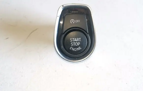 Engine start stop button switch