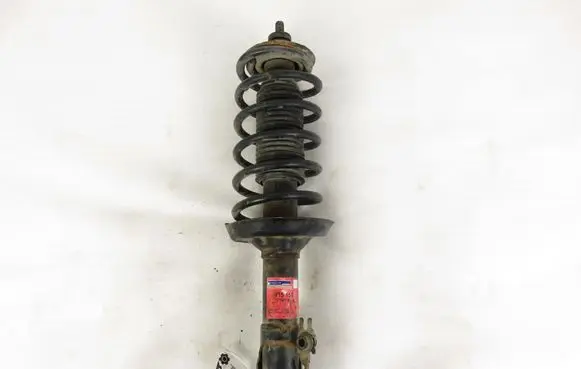 Volkswagen Golf III Front shock absorber with coil spring 115159