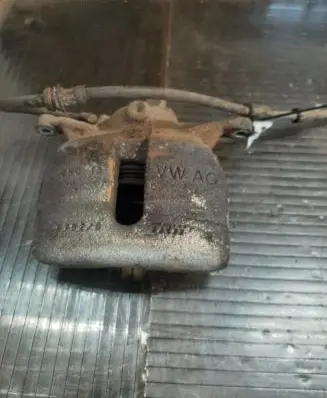 Volkswagen Golf VII Front brake caliper