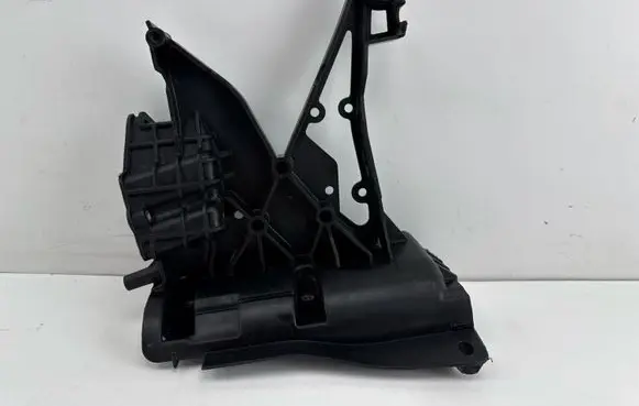 Engine bonnet/hood lock trim molding