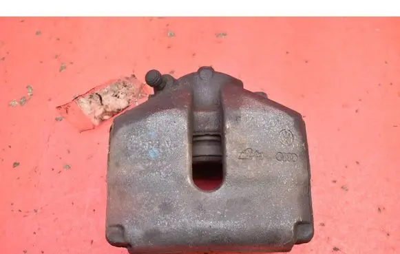 Volkswagen PASSAT CC Front brake caliper 