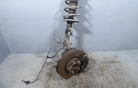 Hyundai ix35 Front shock absorber with coil spring