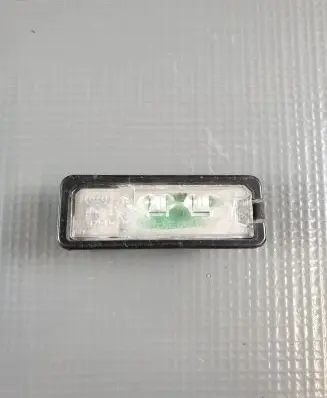 Volkswagen Golf VII Number plate light 1K8943021C