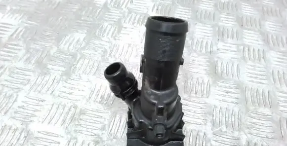 Thermostat/thermostat housing