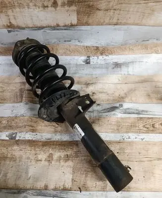 Opel Astra H Front shock absorber with coil spring