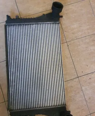 Volkswagen Golf V Intercooler radiator 1K0145803M