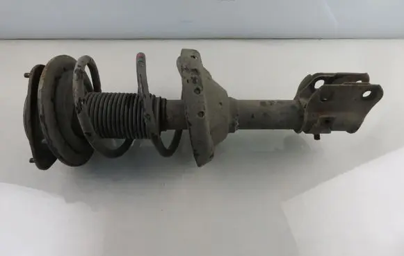 Subaru Legacy Front shock absorber with coil spring