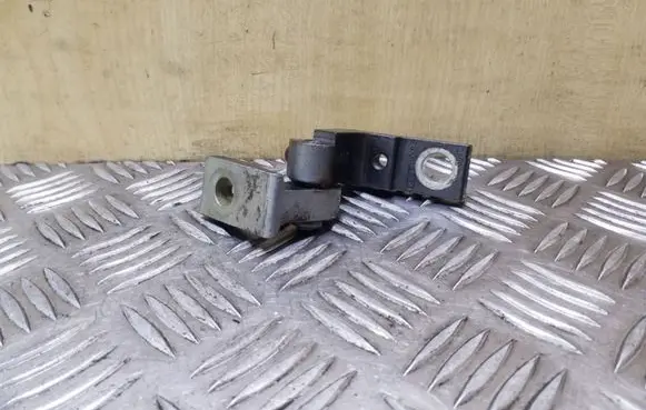 Rear door upper hinge