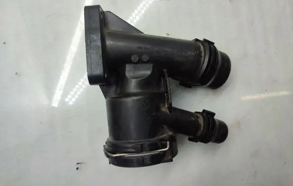 Thermostat/thermostat housing