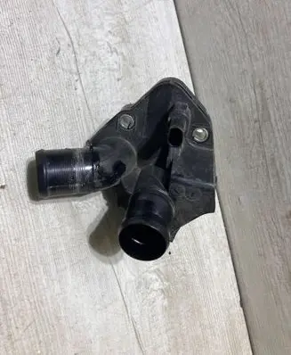 Thermostat/thermostat housing