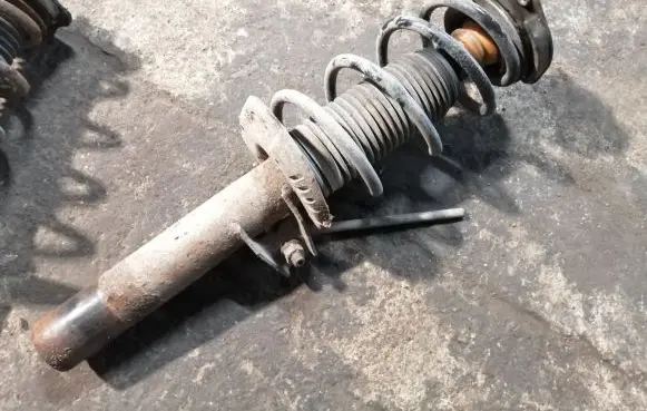 Volkswagen Golf V Front shock absorber with coil spring 1T0413031DP