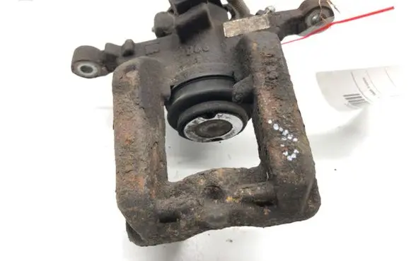 Opel Astra J Rear brake caliper 