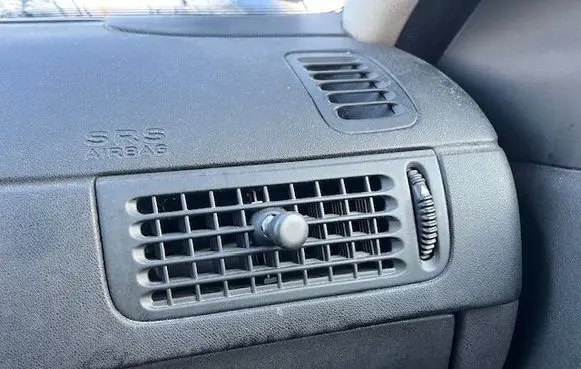 Saab 9-5 Dash center air vent grill 