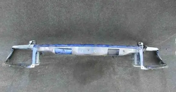 Top upper radiator support slam panel