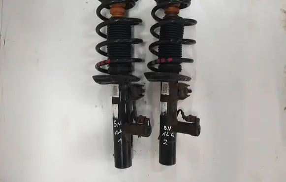 Volkswagen Tiguan Front shock absorber/damper 5N0412021CT