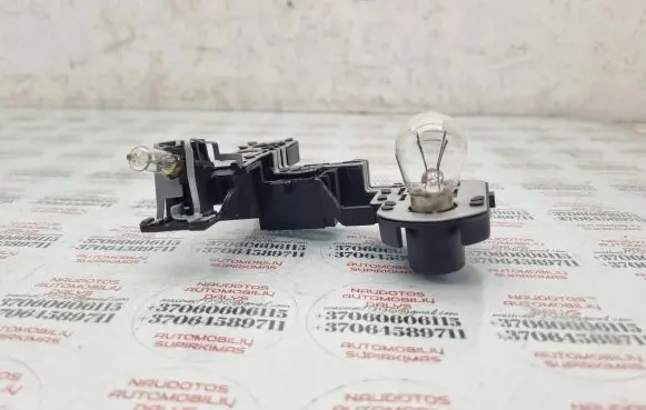 Volkswagen Touareg I Tail light bulb cover holder 7L6945260A