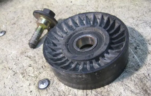 Timing belt tensioner pulley