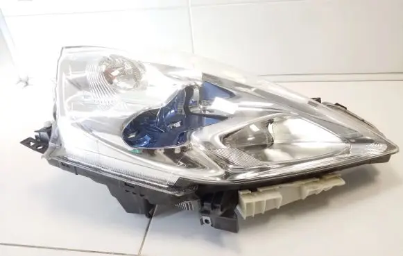 Nissan Leaf I (ZE0) Headlight/headlamp 260103NL5A
