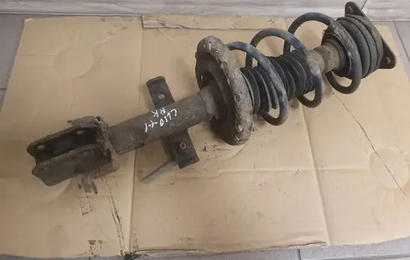 Front shock absorber with coil spring