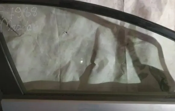 Mazda 5 Front door window glass four-door