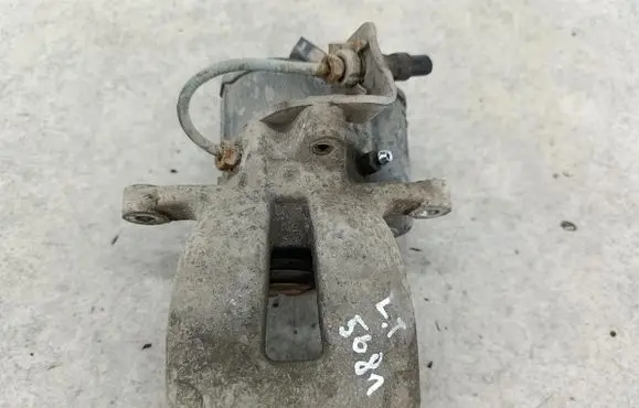 Volkswagen PASSAT B6 Rear brake caliper 