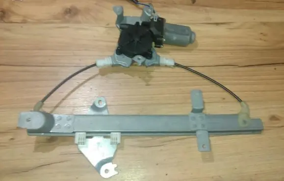 Nissan Primera Sliding door window regulator with motor