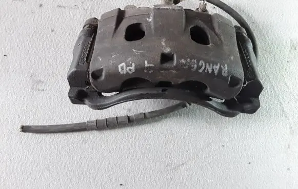 Ford Ranger Front brake caliper AB3128135