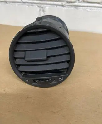 Volkswagen Caddy Dash center air vent grill 2K0819703B