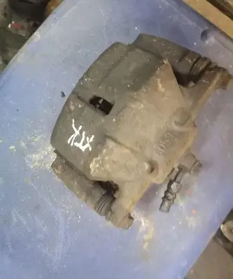 Nissan X-Trail T31 Front brake caliper