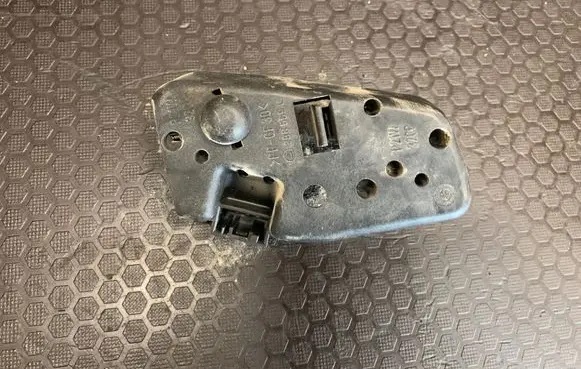 Tail light bulb cover holder