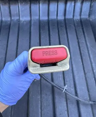 Front seatbelt buckle