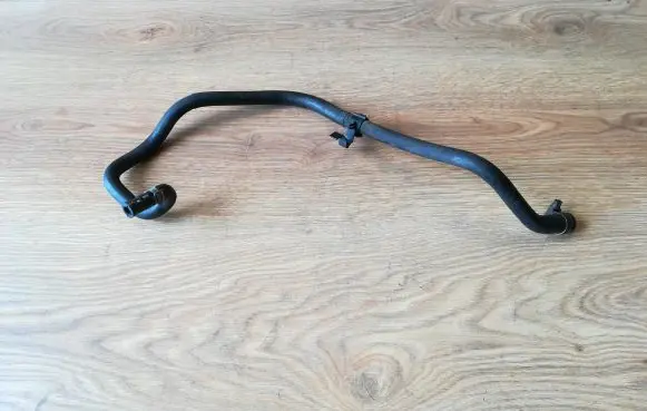 Opel Zafira A Engine coolant pipe/hose 90581632 1301637