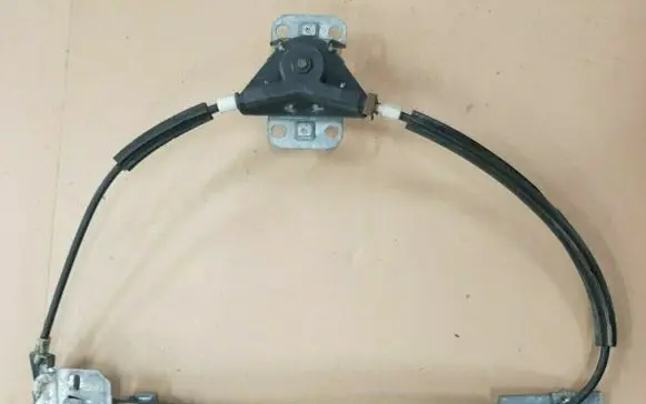 Rear door manual window regulator