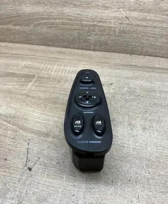 Hyundai Coupe Electric window control switch 9357027000 9357027100