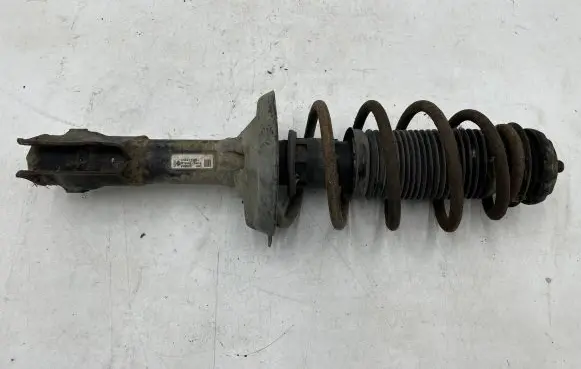 Volkswagen Caddy Front shock absorber with coil spring 6N0413031J
