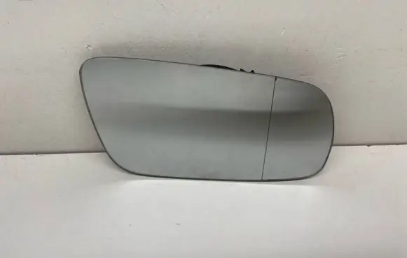 Volkswagen Golf IV Wing mirror glass 3B1857522C