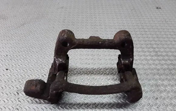 Volkswagen Touran I Brake caliper pad carrier rear 