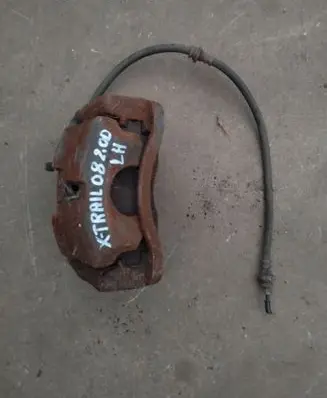 Nissan X-Trail T31 Front brake caliper