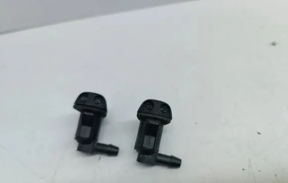 Windshield washer spray nozzle