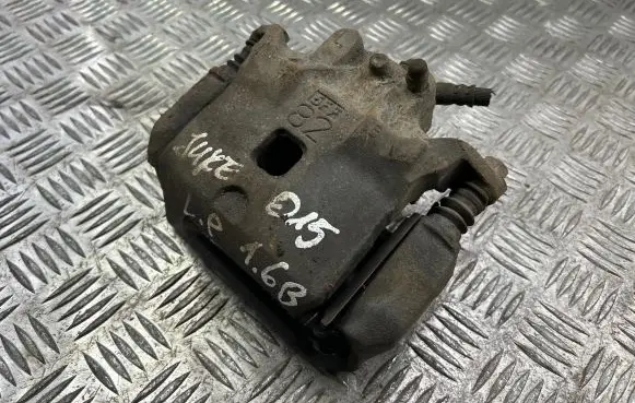 Nissan Juke I F15 Front brake caliper