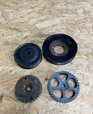 Opel Astra H Timing belt tensioner 5614441 646527