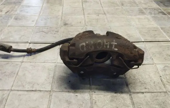 Mazda 3 I Front brake caliper