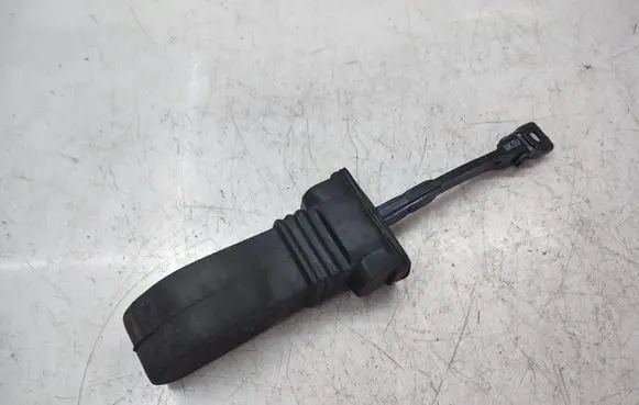 Front door check strap stopper